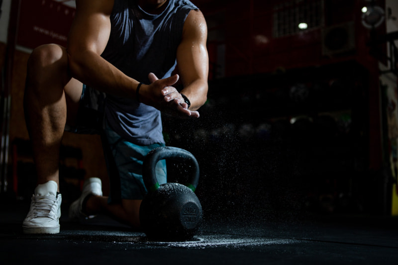 Young man working out, rehab programs for young adults 